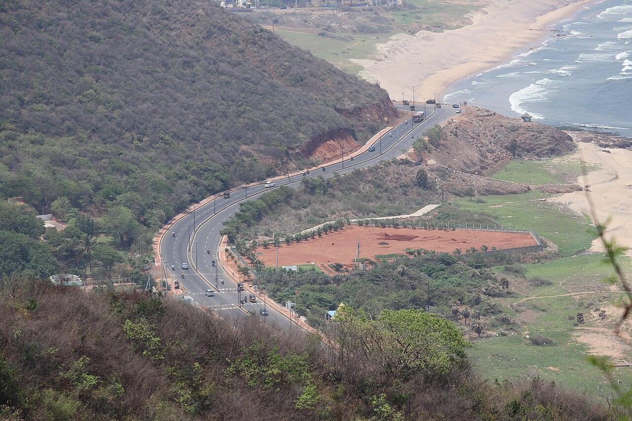 Bheemili beach road winding along the coast north of Visakhapatnam