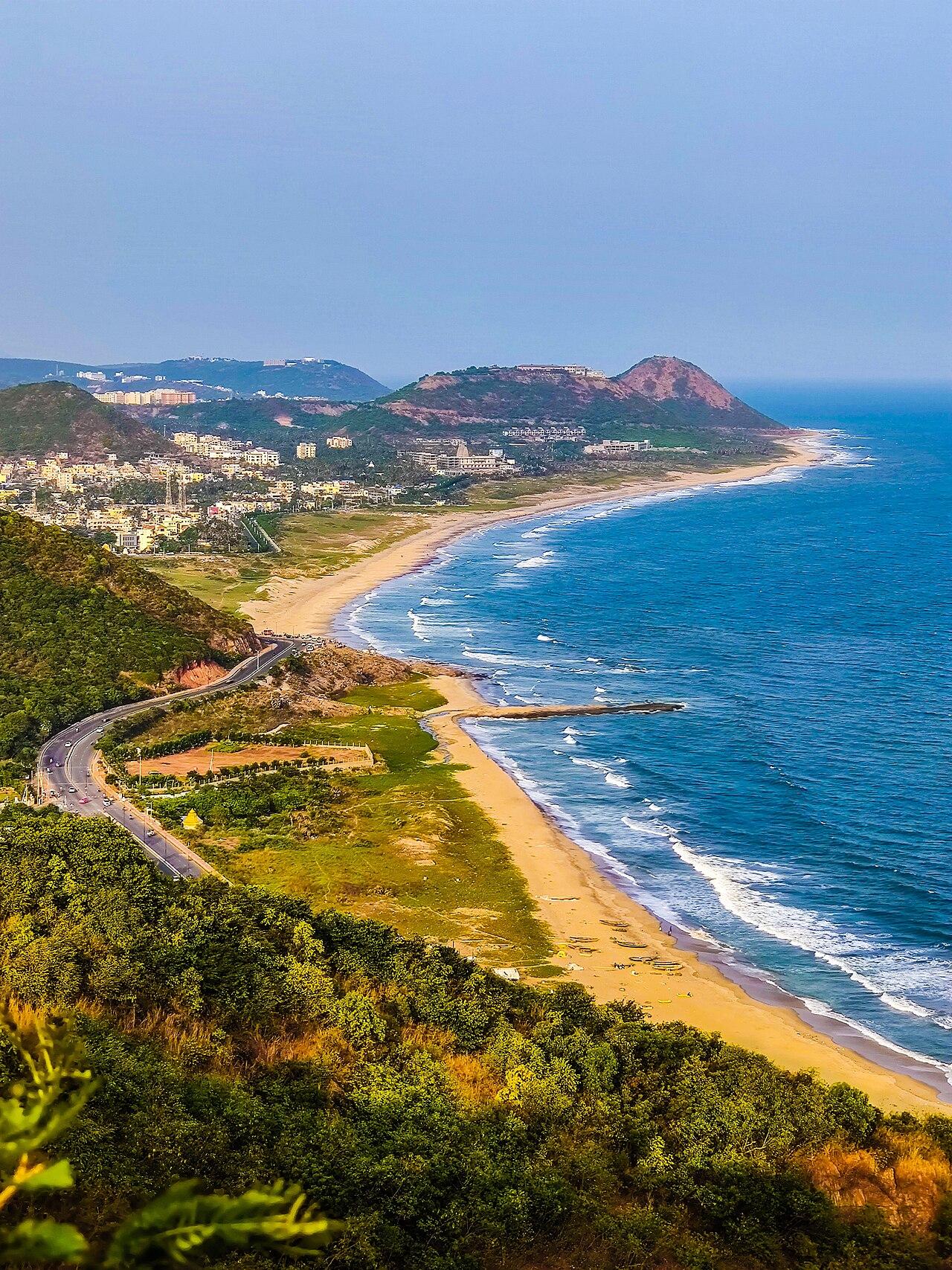The curve of Visakhapatnam's beach road and coastline seen from Kailasagiri hill